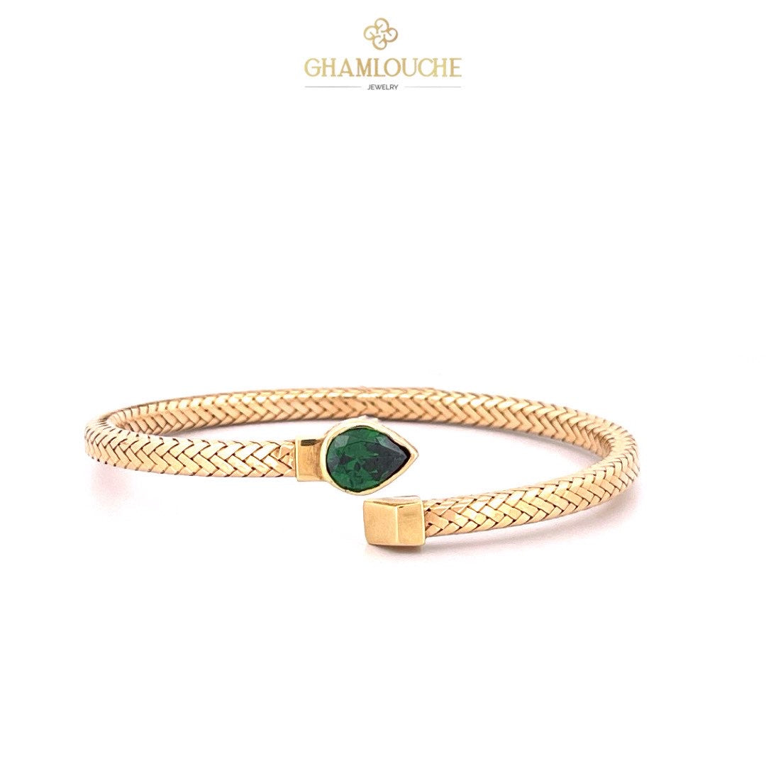 18K Gold Bangle with a Stone