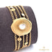 18K Gold Bracelet with a Stone