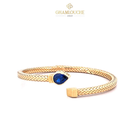 18K Gold Bangle with a Stone