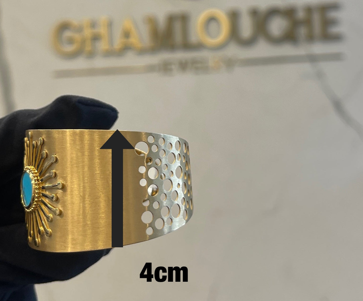18K Gold Bangle with a Stone