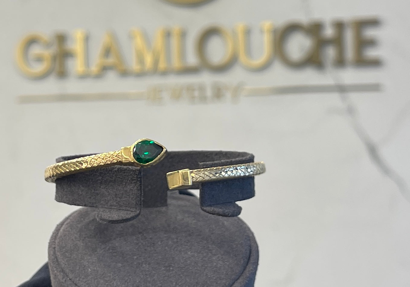 18K Gold Bangle with a Stone