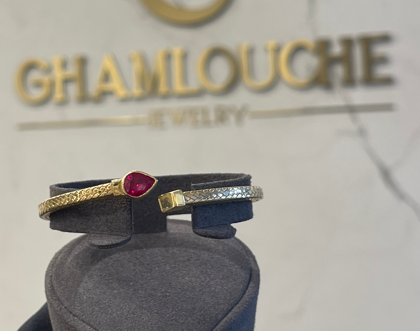18K Gold Bangle with a Stone